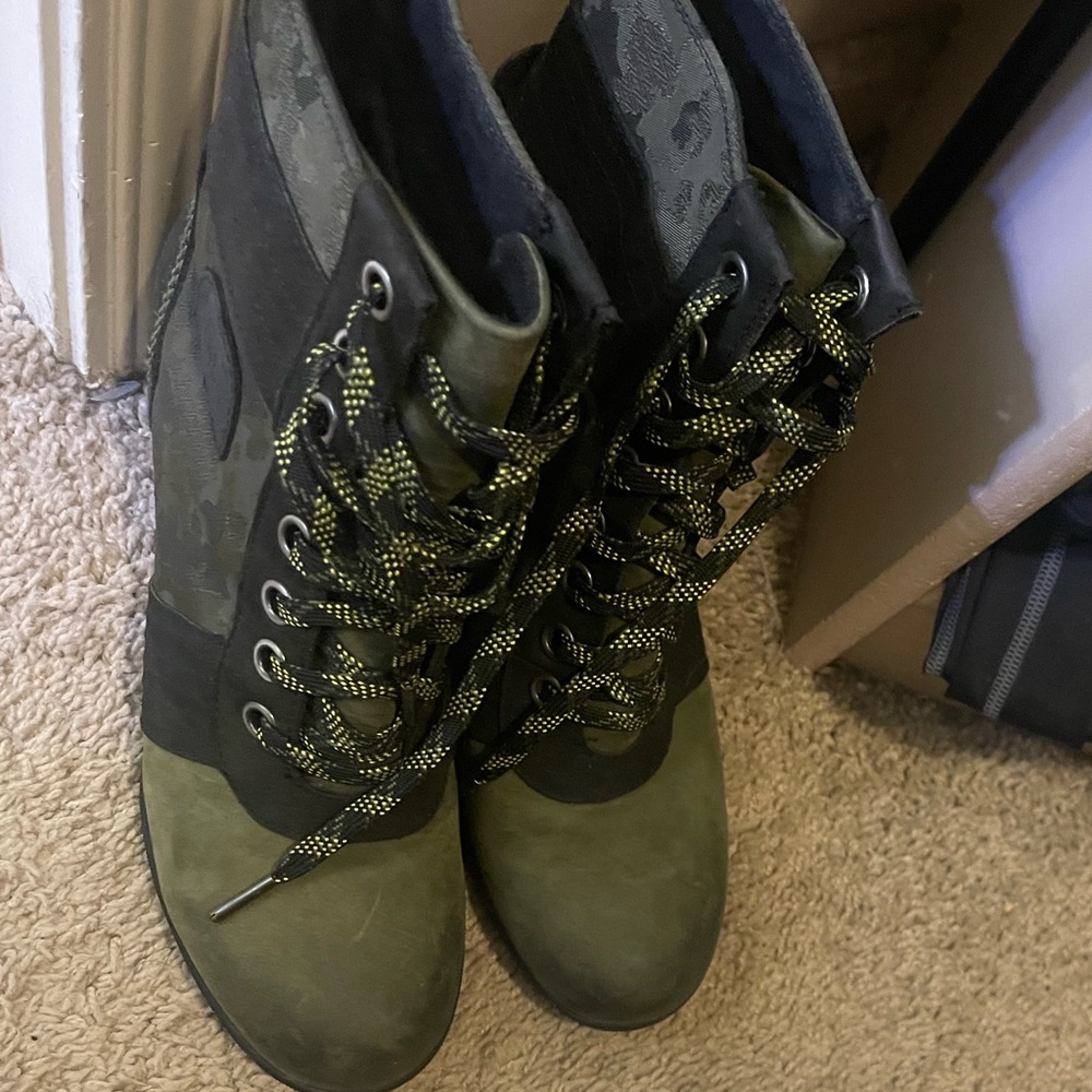 SOREL Lexie wedge lace up waterproof boots.